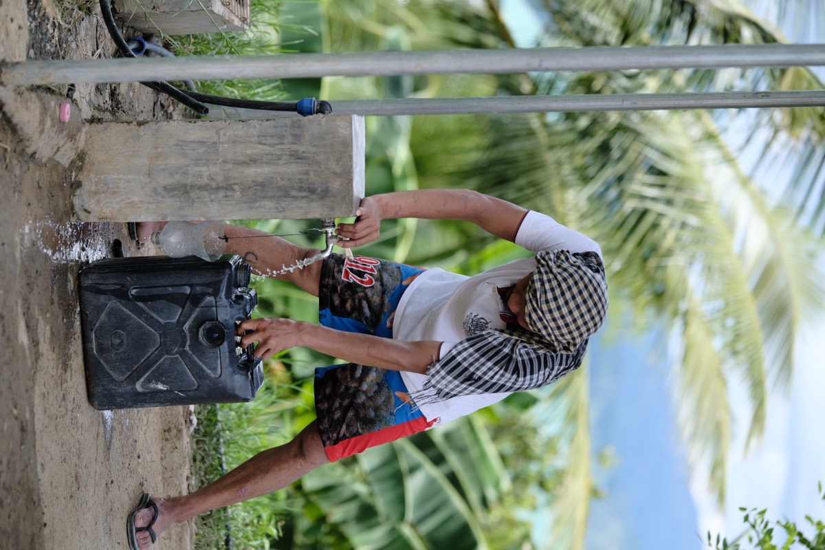 A joyful embrace at a community celebration in Mindanao