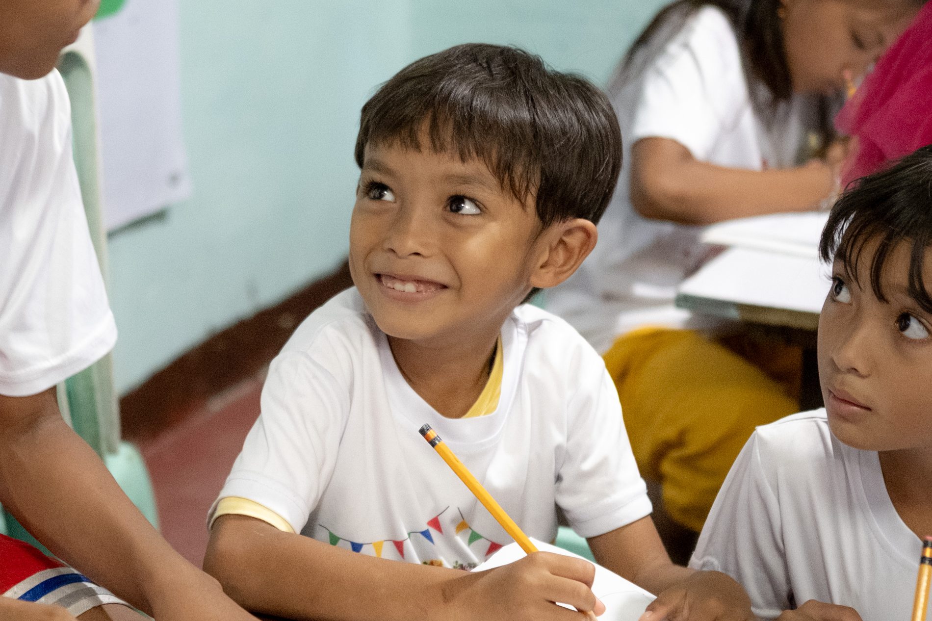 A smiling child at a learning program in Mindanao, Philippines